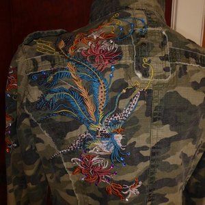 STUDDED, APPLIQUED JACKET SEEKING ADVENTURE